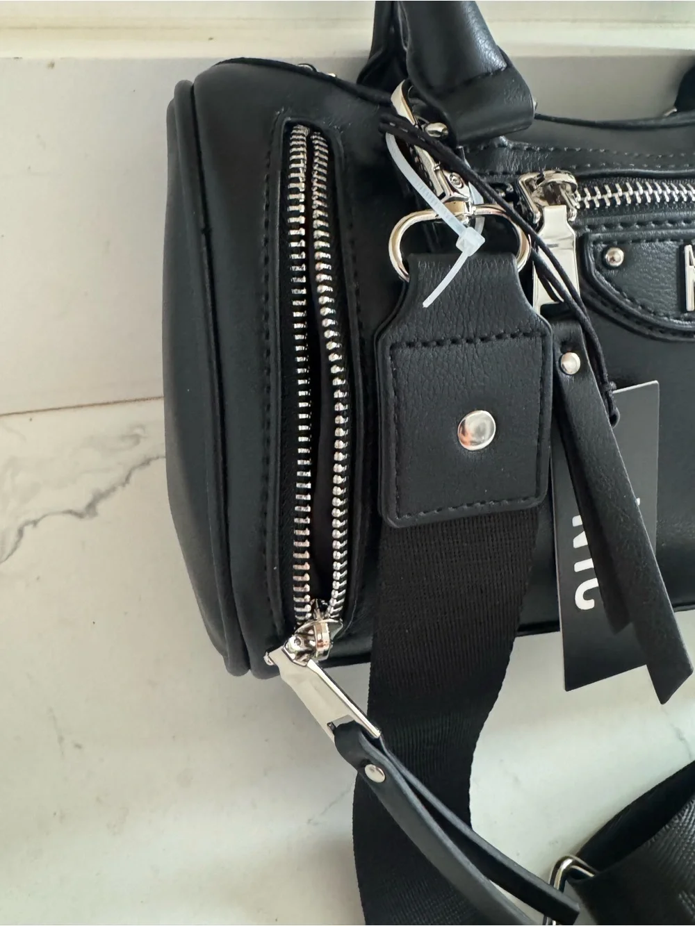 NWT- core barrel Madden NYC Black Satchel with Wide Logo Strap.